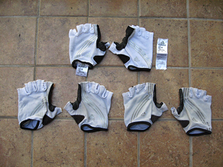 3 Years of white Adistar Gloves: new on top, last year lower left, year prior on lower right