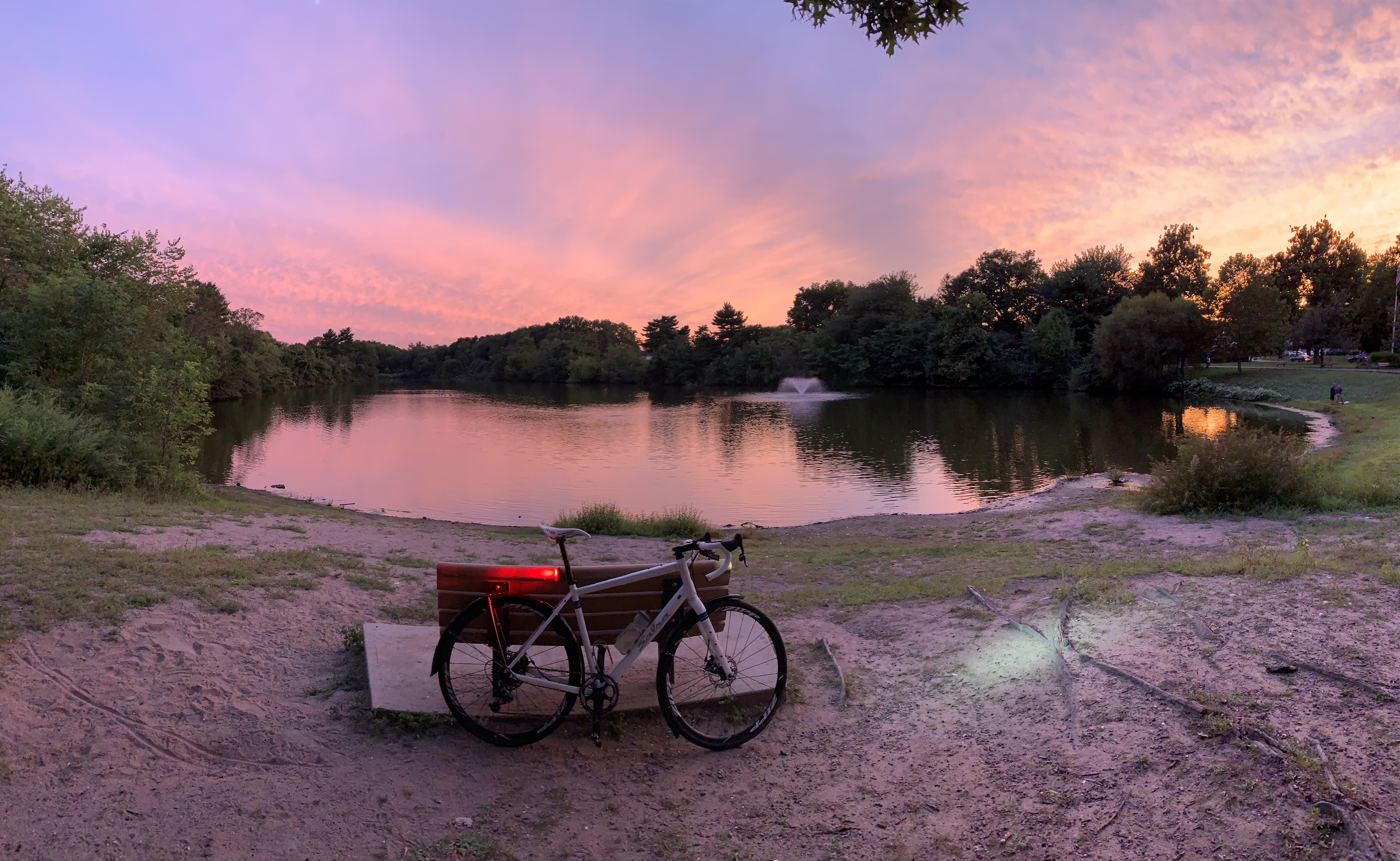 Salsa Journeyman bicycle beside lake at sunset