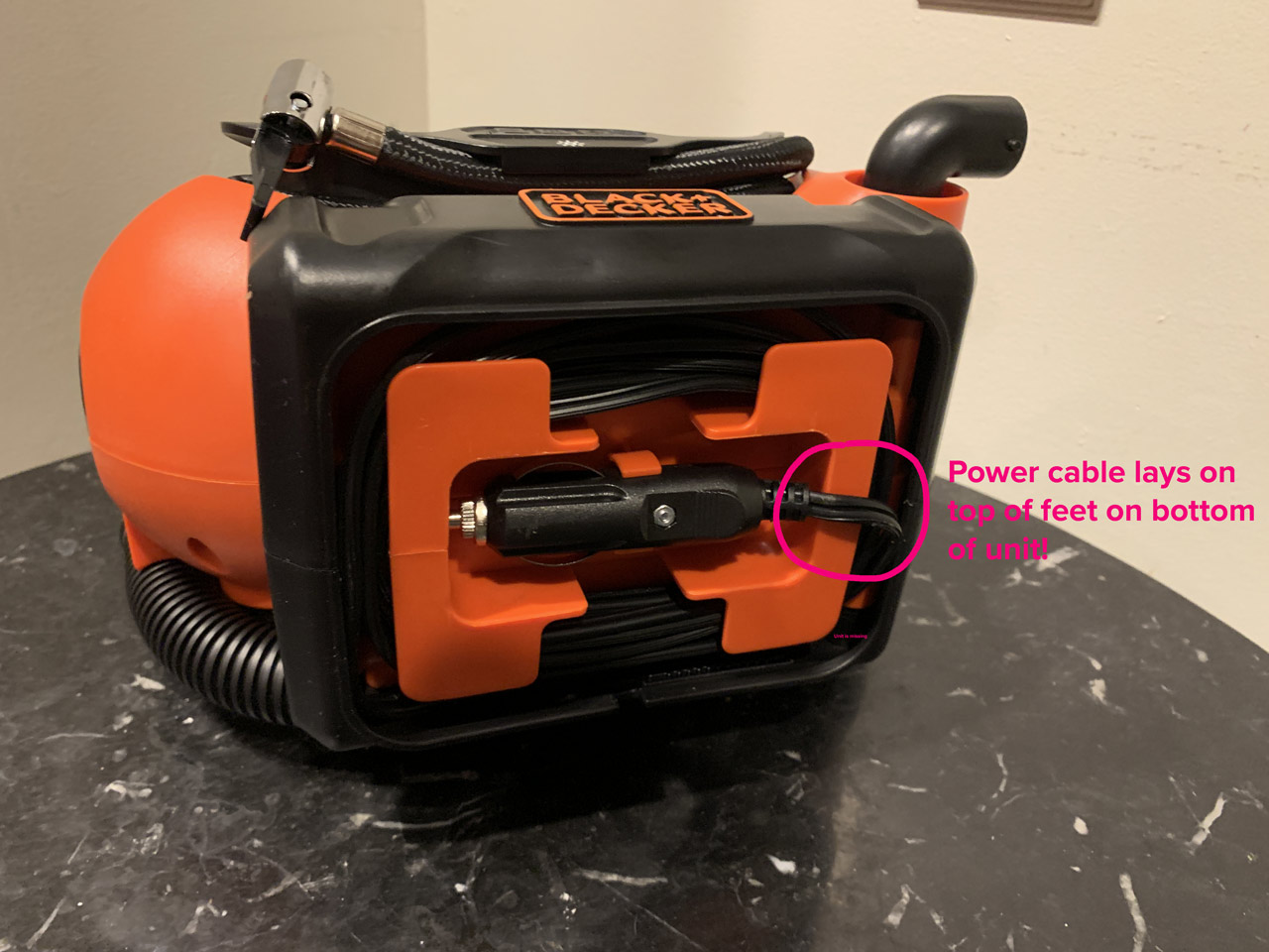 Black & Decker 20V MAX Multi-Purpose Inflator power cable covers the foot on the bottom of the unit
